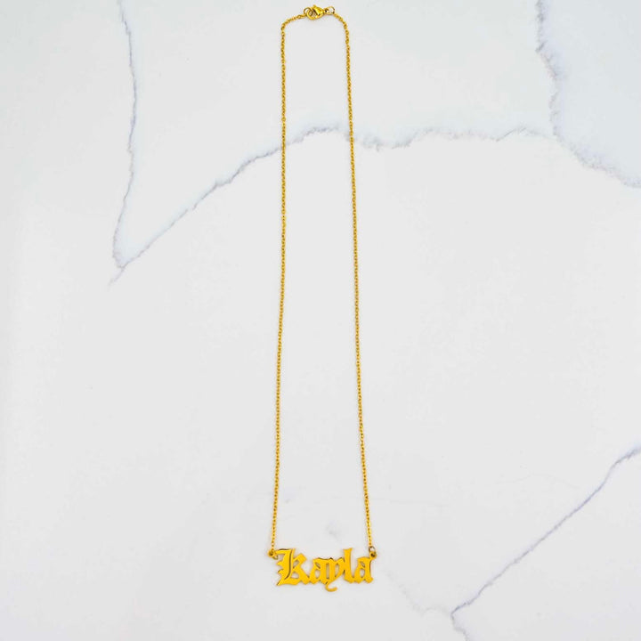 Women's Custom Nameplate Necklace - Gold on White Marble